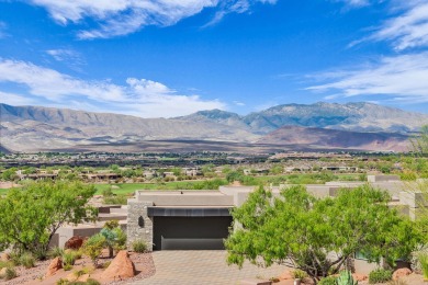 Stunning views and walls of glass bring the red rocks and on Entrada at Snow Canyon in Utah - for sale on GolfHomes.com, golf home, golf lot