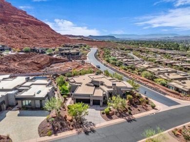 Stunning views and walls of glass bring the red rocks and on Entrada at Snow Canyon in Utah - for sale on GolfHomes.com, golf home, golf lot