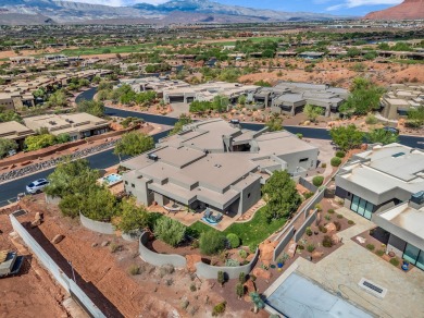 Stunning views and walls of glass bring the red rocks and on Entrada at Snow Canyon in Utah - for sale on GolfHomes.com, golf home, golf lot
