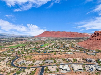 Stunning views and walls of glass bring the red rocks and on Entrada at Snow Canyon in Utah - for sale on GolfHomes.com, golf home, golf lot