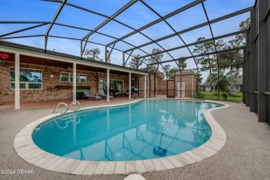 Welcome to this stunning, high-and-dry, custom-built brick home on The Club At Pelican Bay - North Course in Florida - for sale on GolfHomes.com, golf home, golf lot