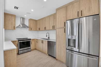 Completely renovated and refined, this two-bedroom, two-bath on Boca West Golf and Country Club in Florida - for sale on GolfHomes.com, golf home, golf lot