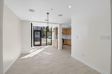 Completely renovated and refined, this two-bedroom, two-bath on Boca West Golf and Country Club in Florida - for sale on GolfHomes.com, golf home, golf lot