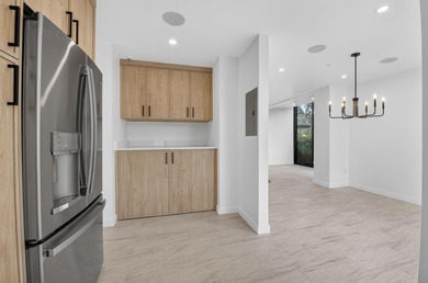 Completely renovated and refined, this two-bedroom, two-bath on Boca West Golf and Country Club in Florida - for sale on GolfHomes.com, golf home, golf lot