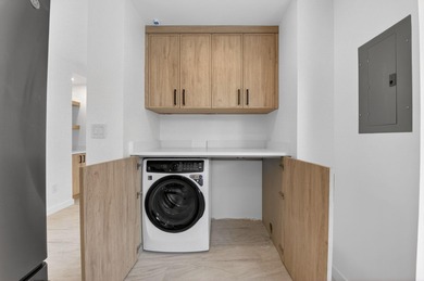 Completely renovated and refined, this two-bedroom, two-bath on Boca West Golf and Country Club in Florida - for sale on GolfHomes.com, golf home, golf lot