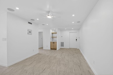 Completely renovated and refined, this two-bedroom, two-bath on Boca West Golf and Country Club in Florida - for sale on GolfHomes.com, golf home, golf lot