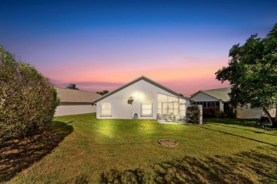 From the moment you approach, this radiant home invites you into on Cypress Lakes Golf Course - West Palm Beach in Florida - for sale on GolfHomes.com, golf home, golf lot