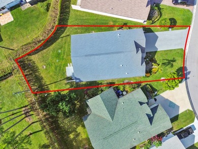 From the moment you approach, this radiant home invites you into on Cypress Lakes Golf Course - West Palm Beach in Florida - for sale on GolfHomes.com, golf home, golf lot