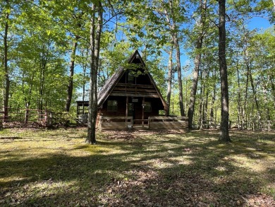 Escape to the simplicity of country living in this charming on Eagle Ridge Golf Course At Yatesville Lake State Park in Kentucky - for sale on GolfHomes.com, golf home, golf lot