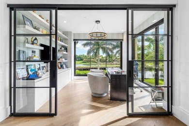 Beyond the private gates of Boca Grove Country Club, a residence on Boca Grove Golf and Tennis in Florida - for sale on GolfHomes.com, golf home, golf lot