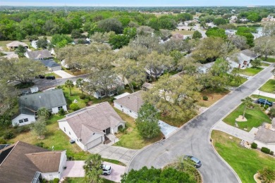 This beautifully maintained Designer Block  Stucco San Miguel on El Diablo Executive Golf Course in Florida - for sale on GolfHomes.com, golf home, golf lot