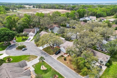 This beautifully maintained Designer Block  Stucco San Miguel on El Diablo Executive Golf Course in Florida - for sale on GolfHomes.com, golf home, golf lot