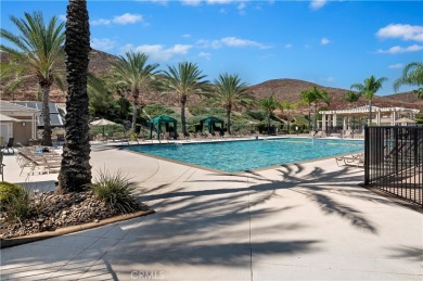 Welcome to your dream home in the stunning Oasis 55+ gated on Menifee Lakes Country Club - Lakes in California - for sale on GolfHomes.com, golf home, golf lot