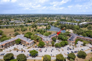 GORGEOUS & PRISTINE WATERFRONT CONDO! PRESTIGIOUS THE FALLS OF on Inverrary Country Club in Florida - for sale on GolfHomes.com, golf home, golf lot