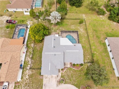 Welcome to this stunning 3-bedroom, 2-bathroom pool home on Oak Hills Country Club in Florida - for sale on GolfHomes.com, golf home, golf lot