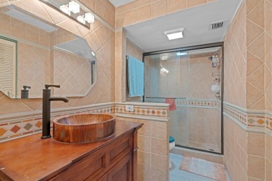 GORGEOUS & PRISTINE WATERFRONT CONDO! PRESTIGIOUS THE FALLS OF on Inverrary Country Club in Florida - for sale on GolfHomes.com, golf home, golf lot