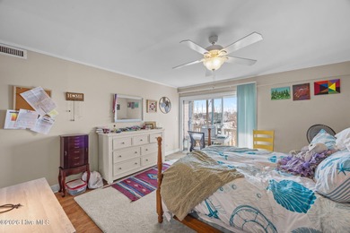 Enjoy stunning waterfront views from this charming 1 bedroom on Harbour Point Golf Club in North Carolina - for sale on GolfHomes.com, golf home, golf lot