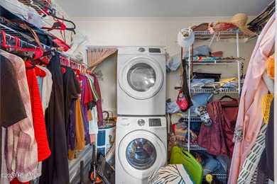 Enjoy stunning waterfront views from this charming 1 bedroom on Harbour Point Golf Club in North Carolina - for sale on GolfHomes.com, golf home, golf lot