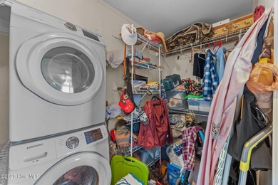 Enjoy stunning waterfront views from this charming 1 bedroom on Harbour Point Golf Club in North Carolina - for sale on GolfHomes.com, golf home, golf lot