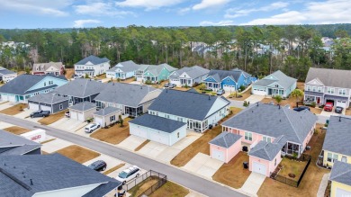 Living is a breeze in this charming 2-bedroom, 2-bathroom home on TPC Myrtle Beach Golf Club in South Carolina - for sale on GolfHomes.com, golf home, golf lot