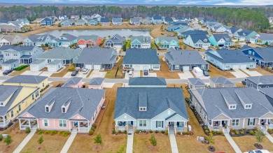 Living is a breeze in this charming 2-bedroom, 2-bathroom home on TPC Myrtle Beach Golf Club in South Carolina - for sale on GolfHomes.com, golf home, golf lot