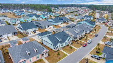 Living is a breeze in this charming 2-bedroom, 2-bathroom home on TPC Myrtle Beach Golf Club in South Carolina - for sale on GolfHomes.com, golf home, golf lot