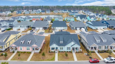 Living is a breeze in this charming 2-bedroom, 2-bathroom home on TPC Myrtle Beach Golf Club in South Carolina - for sale on GolfHomes.com, golf home, golf lot