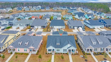 Living is a breeze in this charming 2-bedroom, 2-bathroom home on TPC Myrtle Beach Golf Club in South Carolina - for sale on GolfHomes.com, golf home, golf lot