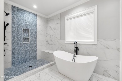 Welcome to your dream home, where Southern charm meets modern on Toqua Golf Course - Loudon County in Tennessee - for sale on GolfHomes.com, golf home, golf lot