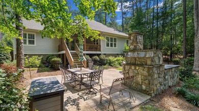 Located minutes from the charming Village of Pinehurst, this on Pinewild Country Club of Pinehurst in North Carolina - for sale on GolfHomes.com, golf home, golf lot