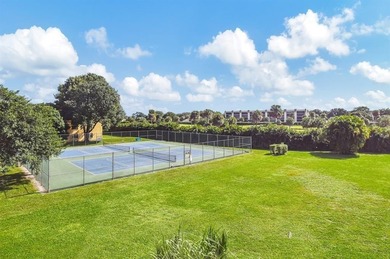 Top floor, corner unit.. Enclosed balcony with brand new Impact on Boca Dunes Golf and Country Club in Florida - for sale on GolfHomes.com, golf home, golf lot