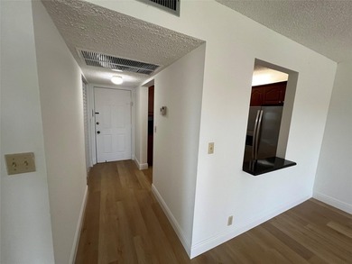 Top floor, corner unit.. Enclosed balcony with brand new Impact on  in Florida - for sale on GolfHomes.com, golf home, golf lot