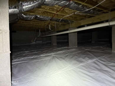 Located minutes from the charming Village of Pinehurst, this on Pinewild Country Club of Pinehurst in North Carolina - for sale on GolfHomes.com, golf home, golf lot