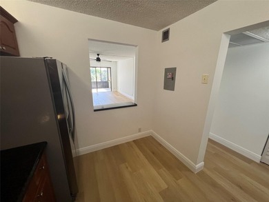 Top floor, corner unit.. Enclosed balcony with brand new Impact on  in Florida - for sale on GolfHomes.com, golf home, golf lot