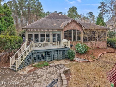 Step into this stunning Zaytoun-Raines custom home and you'll be on Cypress Landing Golf Club in North Carolina - for sale on GolfHomes.com, golf home, golf lot