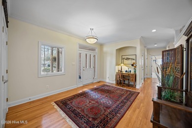 Step into this stunning Zaytoun-Raines custom home and you'll be on Cypress Landing Golf Club in North Carolina - for sale on GolfHomes.com, golf home, golf lot