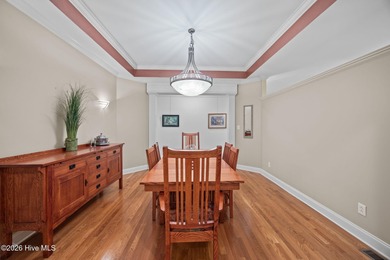 Step into this stunning Zaytoun-Raines custom home and you'll be on Cypress Landing Golf Club in North Carolina - for sale on GolfHomes.com, golf home, golf lot