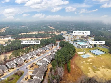 Perfectly positioned above the 10th tee and rolling fairways of on Chapel Ridge Golf Club in North Carolina - for sale on GolfHomes.com, golf home, golf lot