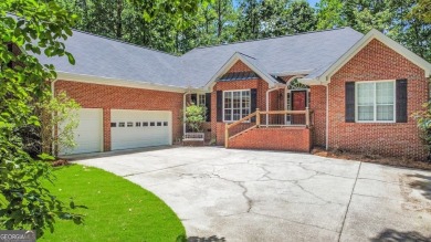 Discover this well-maintained, four-sided brick ranch perfectly on Fairfield Plantation Golf and Country Club in Georgia - for sale on GolfHomes.com, golf home, golf lot