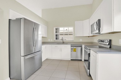 Highly sought-after single-story residence located in the quiet on PGA National Golf Club in Florida - for sale on GolfHomes.com, golf home, golf lot