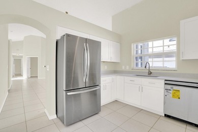 Highly sought-after single-story residence located in the quiet on PGA National Golf Club in Florida - for sale on GolfHomes.com, golf home, golf lot