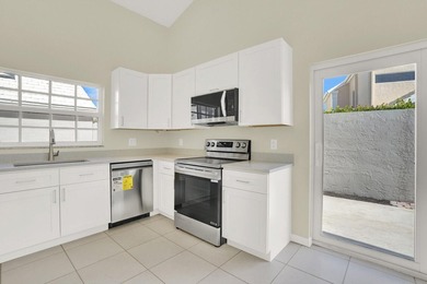 Highly sought-after single-story residence located in the quiet on PGA National Golf Club in Florida - for sale on GolfHomes.com, golf home, golf lot