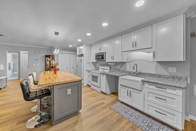 Mid-Century Modern-influenced CBS home in Sandpiper Bay, built on Club Med Sandpiper in Florida - for sale on GolfHomes.com, golf home, golf lot