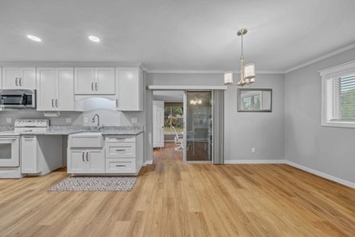 Mid-Century Modern-influenced CBS home in Sandpiper Bay, built on Club Med Sandpiper in Florida - for sale on GolfHomes.com, golf home, golf lot