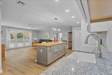 Mid-Century Modern-influenced CBS home in Sandpiper Bay, built on Club Med Sandpiper in Florida - for sale on GolfHomes.com, golf home, golf lot