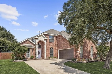 Beautifully updated home tucked away on a quiet end street in on Jim Boggs in Texas - for sale on GolfHomes.com, golf home, golf lot