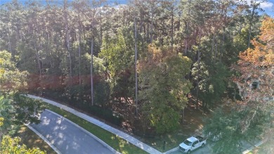 Design your dream home on this spacious corner wooded lot in the on Berkeley Hall Golf Club in South Carolina - for sale on GolfHomes.com, golf home, golf lot