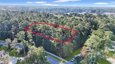 Design your dream home on this spacious corner wooded lot in the on Berkeley Hall Golf Club in South Carolina - for sale on GolfHomes.com, golf home, golf lot