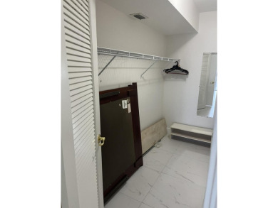 Very desirable bottom floor condo with views of the water, golf on Atlantis Golf Club in Florida - for sale on GolfHomes.com, golf home, golf lot