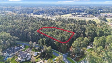 Design your dream home on this spacious corner wooded lot in the on Berkeley Hall Golf Club in South Carolina - for sale on GolfHomes.com, golf home, golf lot